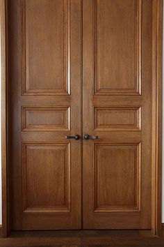 an open wooden door in a room