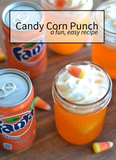 candy corn punch in mason jars on a table