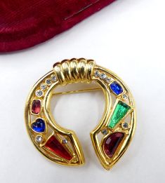 "Vintage gold tone and multi color lucite rhinestone pin brooch, In good vintage condition, Measures 2\"x 2\". Thanks." Collectible Multicolor Costume Jewelry Brooches, Collectible Gold Brooches With Rhinestones, Fine Jewelry Yellow Gold Multi-stone Brooches, Gold Multi-stone Fine Jewelry Brooches, Unique Multicolor Multi-stone Brooches, Vintage Multi-stone Yellow Gold Brooches, Vintage Gold Multi-stone Brooches, Pin Brooch, Vintage Gold