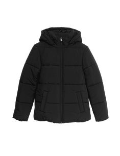 Stay cosy in this Thermowarmth™ puffer jacket. It's designed in a regular fit, with a comfy funnel neck and stylish all-over horizontal quilting. The detachable hood and two side pockets with concealed poppers give a practical touch, while a fleece lining provides extra warmth. Its Stormwear™ technology features an innovative finish to protect from light rain showers, and the concealed internal zip adds a neat look.\n \n M&S Collection: easy-to-wear wardrobe staples that combine clas Anti Chafing Shorts, Swimwear Suits, Quilted Puffer Jacket, Light Rain, Black Puffer, Curves Workout, Detachable Hood, Winter Coats Women, Petite Maternity