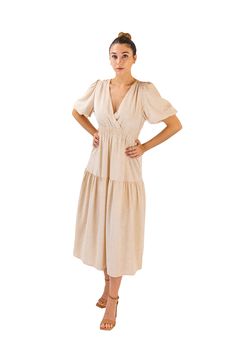 The puff sleeve dress is the perfect choice for you! This dress provides comfort and style since it is made of premium 70% polyester and 30% cotton. With its midi-length design and regular fit, you’ll feel like a glam queen. The soft beige color gives the dress a classic charm, while the V-neckline and short sleeves give it a modern look. The solid pattern allows you the freedom to accessorize however you like. This tiered dress is ideal for a party or enjoying casual occasions. Be ready to turn Summer Cream Midi Dress With Gathered Sleeves, Chic Cream Puff Sleeve Knee-length Dress, Feminine Beige Dress With Gathered Sleeves, Feminine Beige Puff Sleeve Midi Dress, Chic Cream Midi Dress With Gathered Sleeves, Chic Cream Midi Dress With Puff Sleeves, Cream Puff Sleeve Dress With Gathered Sleeves For Brunch, Spring Cream Midi Dress With Gathered Sleeves, Cream Midi Dress With Gathered Sleeves For Spring