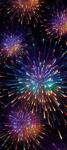 colorful fireworks are lit up in the night sky