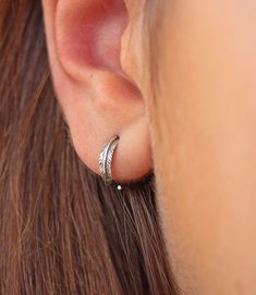 Super versatile huggie earring that hugs your ear perfectly. Extremely comfortable this endless hoop is perfect gift for all earrings lovers. Listing for one single hoop, for pierced ears. Matching stud earrings available here: https://www.etsy.com/listing/609797552/moon-earrings-minimalist-earrings-tiny?ref=shop_home_active_34&pro=1&frs=1 Details: Model wears 18g, 10mm hoop. ► Size/Diameter: Chose (in drop box) from our standart sizes: 8 & 10mm. Availbale in any costum size, per req Adjustable Huggie Wrap Earrings For Pierced Ears, Earrings Conch, Conch Hoop, Huggie Earring, Tiny Hoop Earrings, Drop Box, Handmade Tags, Wooden Jewelry Boxes, Earrings Minimalist