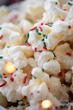 white popcorn with sprinkles and christmas lights