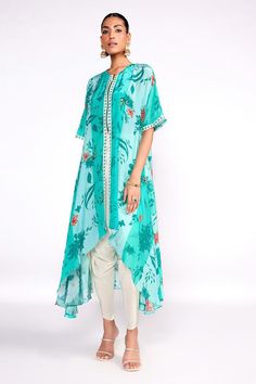 Aqua green crepe front-open kaftan tunic with floral print and cutdana and sequins embroidered placket. Comes with tulip pant and a silk bustier.
Components: 3
Pattern: Printed, Embroidered
Type Of Work: Floral, Cutdana, Sequins
Neckline: Round
Sleeve Type: Half
Fabric: Crepe, Bustier : Silk, Lining : Crepe
Color: Green
Other Details: 
Attached lining
Model Height : 5 ft 8 inches, wearing size S
Closure : Tunic - Front zip
Occasion: Sangeet - Aza Fashions Spring Green Kaftan With Printed Motifs, Green Silk Tunic Kaftan, Elegant Green Georgette Kaftan, Festive Green Georgette Kaftan, Green Georgette Summer Kurta, Green Georgette Kaftan For Eid, Green Georgette Kurta For Summer, Summer Traditional Drape Kaftan With Printed Motifs, Green Bohemian Kaftan For Designer Wear