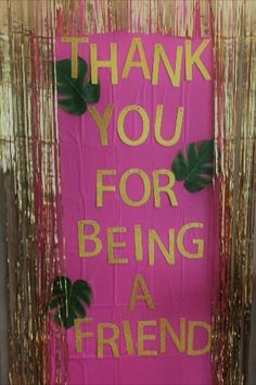 a pink sign that says thank you for being a friend with gold foil fringes