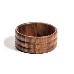 three wooden bowls stacked on top of each other