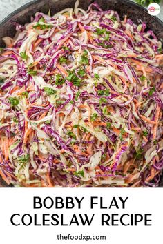 a bowl filled with coleslaw and garnished with parsley