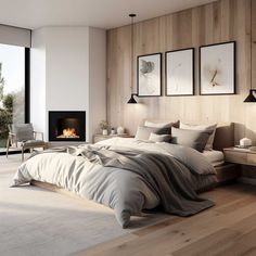 a large bed sitting in a bedroom next to a fire place on top of a hard wood floor