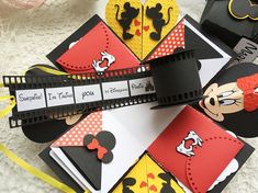 some mickey mouses and other items on a table