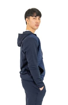 A breathable, wrinkle-resistant cotton blend offers four-way stretch comfort in a modern jacket. 26" length Fixed hood 50% cotton, 43% polyester, 7% spandex Hand wash, line dry Imported Cotton Athleisure Activewear With Double-lined Hood, Cotton Techwear Hooded Jacket For Sports, Techwear Cotton Hooded Jacket For Sports, Stretch Cotton Outerwear For Outdoor, Cotton Long Sleeve Windbreaker Sportswear, Cotton Athleisure Track Jacket For Gym, Sports Cotton Long Sleeve Windbreaker, Cotton Track Jacket With Double-lined Hood For Outdoor, Outdoor Cotton Track Jacket With Double-lined Hood