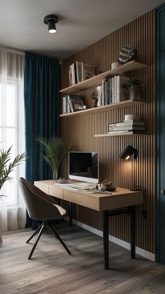 a desk with a computer on top of it in front of a bookshelf