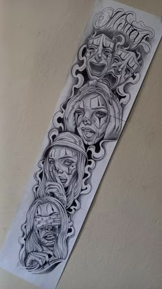 an image of some tattoos on the side of a piece of paper that is hanging from a wall