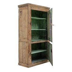 an old wooden cabinet with green glass doors