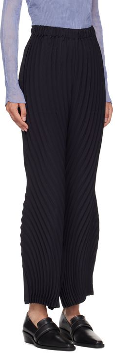 Lightweight wide-leg hand-pleated polyester canvas trousers. · Elasticized waistband · Two-pocket styling · Curved outseams Supplier color: Midnight navy Wide Leg Bottoms With Folds, Wide Leg Bottoms With Folds For Workwear, Chic Wide Leg Bottoms With Folds, Navy Pleated Bottoms For Spring, Spring Navy Pleated Bottoms, Pleated Trousers, Midnight Navy, Issey Miyake, Top Brands