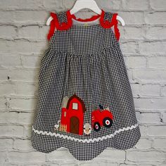 Gingham Farm Animals Dress ~~ Red Shoulder Button ~~ By: Everlasting Heirloom Adorable Black & White Checker Pattern Dress Featuring Red Accent Trim And Buttons. Stunning Embroidery Stitching With The Barn, Tractor, And Farm Animal's Adds Tons Of Charm And Character To This Sweet Little Dress. Tagless Fully Lined Eyelet Detailing Button Shoulders Embroidered Stitching 100 % Cotton Original ' Heirloom Baby Collection' " Handstitched With Love " Rn # 161110 00887800 Hls _ 876 This Is A Brand New I Cute Gingham Dresses For School, Cute Gingham School Dress, Playful Gingham Dress For Playtime, Plaid Cotton Dress For Playtime, Yellow Baby Dress, Red Formal Dresses, Pink Sweater Dress, Frozen Dress, Pineapple Dress