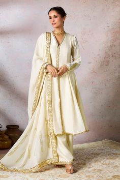 Ivory kurta with embroidered neckline and gold motif embroidery on the sleeves. Paired with a pant and embroidered dupatta. - Aza Fashions Lace Kurta, Gold Motif, Motif Embroidery, Kurta Pant Set, A Line Kurta, Embroidered Dupatta, Lace Neckline, Embroidered Neckline, Organza Dupatta