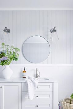 Classic neutral bathroom blending Queenslander style in timber-lined walls with VJ panelling above wainscoting with marble-topped vanity and conical glass wall lights. Hampton Bathroom Ideas, Modern Hamptons Bathroom, Hamptons Bathrooms, Hamptons Style Bathroom, Street Appeal, Styl Hampton