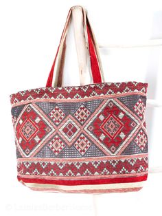 Whether you're going to the beach, or going just for a walk, Our Berber Bags got you covered. They are stylish, yet spacious enough to hold your essentials. Our handmade bags are made by skilled women in the Atlas Mountains in Morocco using only the highest quality materials. With attention to detail and quality that stands the test of time.  The bags are handcrafted from a beautiful woven fabric, 100% cotton that is lightweight, yet durable and elegant.  The bag has no zip for easy access to your items. It is lined inside and offers one large pocket.  Measurements: Width- 62 cm Height- 42 cm Handle Height- 34cm To get back to my shop, click here: https://www.etsy.com/uk/shop/LamiasBerberHome Say Hi on Instagram @lamiasberberhome Summer Bags With Removable Pouch, Natural Beach Bag With Removable Pouch For Travel, Large Capacity Pouch Beach Bag, Summer Travel Hobo Bag With Removable Pouch, Summer Travel Pouch Bag, Large Capacity Beach Bag For Travel, Summer Travel Bag With Removable Pouch, Travel Pouch Bag For Beach Season, Summer Style Pouch Hobo Bag For Travel