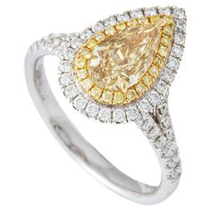 Fancy Light Brownish Yellow Diamond White Gold 18K Ring. GIA certificate: VS1, natural, fancy light brownish yellow, 1.17 carats. diamonds round natural 70 pieces, 0.47 carats, VS-F. Ring Size: 51.5 / 5.75 US. Weight: 4.89 grams. Exquisite Yellow Round Jewelry, Exquisite Yellow Hallmarked Jewelry, Fancy Intense Yellow Diamond Ring, Canary Yellow Diamond Ring 1stdibs, Brownish Yellow, Fancy Lights, Fancy Yellow Diamond, Gold Light, Yellow Diamond