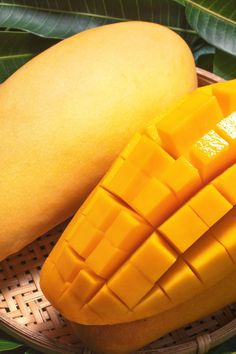 a close up of a mango on a plate