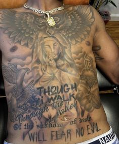 a man with an angel tattoo on his chest and words written below the tattoos that say, though walk among the fallen