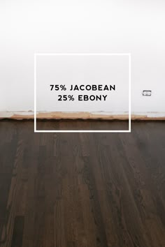 an empty room with wood flooring and white walls that says 75 % jacobean 25 % ebony