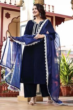 Navy blue straight kurta with placement gota embellishments. Paired with a pant and organza dupatta with scallop gota embellishments on the border. - Aza Fashions Blue Georgette Sets With Embroidered Border, Elegant Blue Unstitched Suit With Embroidered Border, Elegant Blue Sets With Embroidered Border, Elegant Blue Salwar Kameez With Embroidered Border, Royal Blue Designer Wear Dupatta, Bollywood Style Royal Blue Dupatta, Blue Unstitched Suit With Dupatta, Embroidered Royal Blue Dupatta, Velvet Kurta