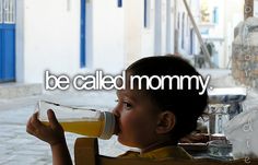 a young child drinking from a bottle with the words be called mommy