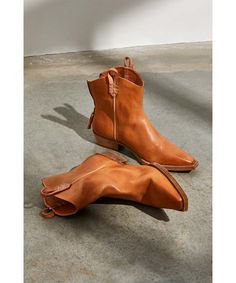 Your new go-to boot all season long, these western-inspired leather boots from the Free People We The Free collection are featured in a short silhouette with square pointed toe and contrast sole for added dimension. Back zip closure Hand-stitched detailing throughout Unique studded bottom sole Specially designed side tabs Fit tip: This style runs true to size, if in between sizes; we suggest sizing up. Care/Import Import Measurements for size 37 Heel: 1.26 in Shaft: 5.51 in Ankle Circumference: Bodysuit Blouse, Velvet Heart, Michael Stars, Strap Shoes, Purse Strap, Scarf Jewelry, Backpack Purse, Jeans For Sale, Fall Trends