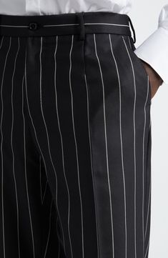 Polished pinstripes bring this season's pared-down precision to runway-featured trousers tailored in Italy from pure wool. Zip fly with button closure Front slant pockets; back button-welt pockets 100% wool Dry clean Made in Italy Designer Clothing Tailored Pinstripe Tapered Leg Pants, Tailored Pinstripe Straight Leg Dress Pants, Tailored Pinstripe Dress Pants With Tapered Leg, Pinstripe Dress Pants With Welt Pockets For Work, Tailored Pants With Vertical Stripes And Tapered Leg, Pinstripe Tapered Leg Business Bottoms, Pinstripe Tapered Leg Business Casual Pants, Tailored Tapered Leg Pants With Vertical Stripes, Pinstripe Tapered Leg Pants For Formal Occasions