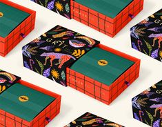 an assortment of colorful boxes with designs on them