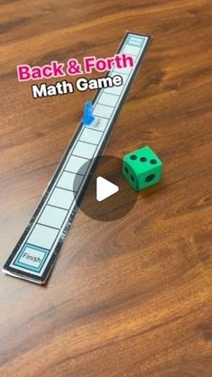 the back and forth math game is shown with two dices on top of it