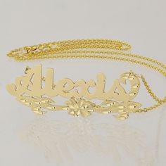 "*Average Name Pendant Width : 1 7/8 Inch (4.8 cm) Approx. *Up to 9 Letters. *Pendant Thickness : 0.5 mm / 25 Gauge / 0.020\" *Premium high end quality personalized laser cut out any letters/numbers in 10kt or 14kt solid yellow or white gold personalized name necklace, this item comes with split sturdy 1.0 mm Rollo chain from 15~20 inches, name pendant length not included on length option. *This pendant cut out by latest technology laser machine, top quality guaranteed." Gold Polished Nameplate Jewelry, Personalized Gold Jewelry With Polished Finish, Personalized Nameplate Jewelry With Polished Finish, Elegant Name Necklace With Flower Pendant, Custom Engraved Gold Plated Nameplate Necklace, Gold Necklace With Polished Flower Pendant, Gold Polished Nameplate Necklace, Gold Nameplate Necklace With Polished Finish, Gold Custom Necklace With Polished Finish For Anniversary