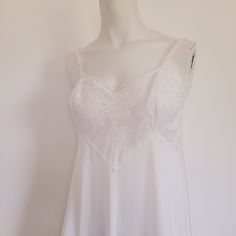 Vintage Behind Every Olga There Really Is An Olga Nightgown! White Gorgeous Unusual Full Lace Bodice Sheer. Elastic Straps. Very Classic And Sexy! Perfect For Boudoir. Great Pre-Owned Condition Size 36 Weddings/Bridal, Retro. Pinup. Tags: Western Hippie Ranchwear Urban Style Chic Boho Vibes Bohemian Festival Summer Fall Winter Spring Southwestern Southwest Cowgirl Fashion Trendy Blogger Aztec Ethnic Tribal Vintage Retro Edgy Gypsy Native Casual Rodeo Chunky Aesthetic Coachella Bohochic Kilm Vintage White Nightgown For The Beach, White Lace Nightgown, Vintage White Lace Nightgown, White Vintage Nightgown With Floral Print, Olga Nightgown, White Lace Nightgown With V-neck, Olga Nightgown Vintage, Retro Pinup, Festival Summer