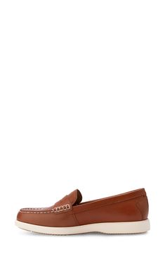 A classic penny keeper and supple leather upper lend modern sophistication to a luxe loafer set on a cushioned footbed and slip-resistant sole. Leather upper/textile lining/rubber sole Imported