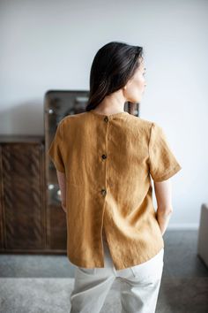 "FREE WORLDWIDE EXPRESS DELIVERY FOR ALL ORDERS OVER 60 EUR! Free gift set of 2 tea towels for all orders over 250 EUR value! Linen Top With Buttons / Back Buttoned Linen Blouse This simple and cozy linen blouse is made of high quality, pure and natural European linen. This handmade and sustainable item is softened and looks better and better with age and every wash. * 100% pure and natural medium weight European linen * stonewashed * breathable, anti-allergic, anti-static * light, very durable White Linen Top, Shirt With Buttons, Top With Buttons, Back Back, Natural Linen Fabric, Summer Linen, European Linens, Linen Skirt, Linen Blouse