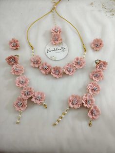 Celebrate the beauty of nature with our unique floral jewelry. Each piece is inspired by the stunning patterns and colors found in gardens and fields. Whether you're looking for a simple and elegant accessory or a bold statement piece, our collection has something for everyone.suitable for Bride , Bridesmaid , wedding favors & gifting. Note : Buyer country all TAXES & CUSTOM DUTY will be paid by buyer.           : Color may be vary because of camera flash & different computer screens. This is 4 Flower Decorated Jewelry For Weddings And Festivals, Gold Necklaces With Flower Decoration For Wedding, Gold Necklace With Flower Decoration For Wedding, Adjustable Festive Jewelry Sets For Weddings, Flower Pendant Jewelry With Flower Charm For Wedding, Floral Jewelry For Parties, Floral Necklace For Wedding, Traditional Handmade Flower Jewelry For Wedding, Traditional Wedding Jewelry With Handmade Flowers