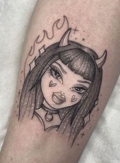 a girl with horns on her head is shown in the tattoo style, and has an evil