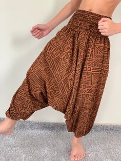 "Kids Harem Pants , baggy unisex harem pants have the \"flow\", perfect of yoga or just a cool strolling. Comfort and character are what these pants are all about. They have the traditional sarong look & feel but a lot more practical when it comes to activity like yoga. As a bonus, they are convertible! Just pull them up and you get yourself a cute jumpsuit in a flash. Together with elastic cuff legs, you can wear them short or long. The pants have smock waist (wide bang elastic) with no pocket. Kids Harem Pants, Samurai Pants, Thai Fisherman Pants, Cute Jumpsuit, Yoga Trousers, Fisherman Pants, Wrap Pants, Pants Baggy, Dark Outfits