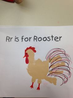 a child's drawing of a rooster with the words rr is for rooster