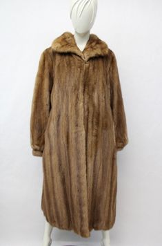 "BEAUTIFUL & VERY STYLISH PASTEL MINK FUR COAT FOR WOMEN!  THE COLLAR STYLE IS \"WING\", IT CLOSES WITH HOOK & EYE CLOSURE AND HAS TWO SIDE POCKETS AND BRACELET CUFFS. THIS COAT IS PRE-OWNED: THE FUR IS \"EXCELLENT\", THE BEST CONDITION POSSIBLE AND THE INSIDE LINING IS \"MINT\", THE SECOND BEST CONDITION! AFTER BUYING THIS ITEM, IT WOULD BE VERY MUCH APPRECIATED IF YOU COULD PROVIDE YOUR HEIGHT, WEIGHT AND BUST CIRCUMFERENCE, SO WE CAN ADJUST THE COAT TO YOUR SIZE, BEFORE SHIPPING, IF NEEDED. I Classic Long Sleeve Fur Coat For Fall, Brown Full-length Outerwear For Fall, Classic Fitted Long Sleeve Fur Coat, Formal Long Sleeve Mink Outerwear, Brown Full-length Winter Outerwear, Vintage Long Sleeve Mink Outerwear, Classic Long Sleeve Mink Outerwear, Fur Hat Men, Coat Jacket Women