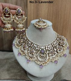 *Light Weight Kundan layered necklace set with earrings and tikka. *Studded with kundan stone. *Light Weight Gold kundan necklace. * Necklace width- 2.5 inches( Included drops) *Earrings Length- 3.4 inches(included pearl drop) *Earrings width Size- 1.5 inches Purple Jewelry For Festivals And Celebrations, Festive Purple Chandbali Jewelry, Purple Kundan Bollywood Jewelry, Purple Kundan Jewelry For Diwali, Festive Purple Kundan Jewelry, Festive Bollywood Purple Jewelry, Festive Purple Bollywood Jewelry, Purple Kundan Necklace For Gifting, Purple Kundan Necklace Gift