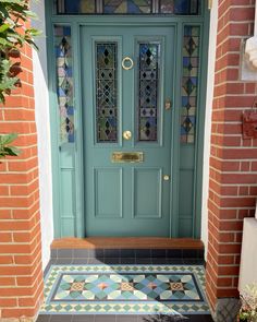 a blue door with stained glass on it