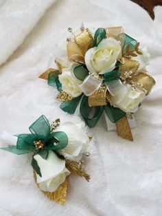 two bridal bouquets with white and green flowers