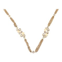 Designer: custom Material: 18K yellow gold Diamonds: 73 round cut = 3.50cttw Color: G Clarity: VS Dimensions: necklace measures 32-inches in length Weight: 34.70 grams Bubble Station, Station Necklace, Drop Necklace, Round Cut, Gold Diamond, Chain Necklace, Gold Necklace, Bubbles, Jewelry Necklaces