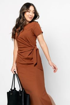 Thicker material w/ stretch Adjustable tie at the waist Midi length Ruched silhouette Fits true to size If between sizes, size up Styled with the Lia Heels Length: approx 49.5" from top of shoulder to front hem SLAY! Our fav sassy dress is back in a new color. This earthy brown is EVERYTHING... *OUT OF STOCK? Select your size & sign up for restock notifications. *Holley is 5'5, wearing a small in the try on video. *Lex is 5’6, wearing a small. //Sizing// Small: Size 2-4 Medium: Size 6-8 Large: Size 10-12 Extra Large: Size 14 Fabric: 67.5% Rayon, 29% Nylon, 3.5% Spandex Wash/Care: Gentle cycle cold, line dry. Fall Midi Dress With Tie Waist And Short Sleeve, Chic Fitted Dress With Side Ties, Casual Fitted Midi Dress With Tie Fastening, Fitted Midi Dress With Tie Waist, Chic Fitted Dress With Tied Details, Casual Brown Tie-back Dress, Casual Brown Dress With Tie Back, Fitted Cotton Midi Dress With Tie Waist, Cotton Knee-length Dress With Tie Waist