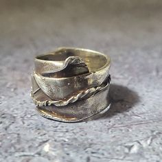 Sterling Silver Antiqued cast ring. One of a kind, millstone original. Antique Bronze Hand Cast Ring, Hand Forged Wide Band Ring As Gift, Hand Forged Wide Band Ring For Gift, Unique Bronze Open Ring, Hand Forged Thick Band Wide Ring, Hand-cast Bronze Round Ring, Unique Bronze Rings For Anniversary, Unique Open Ring In Bronze, Brass Ring With Lost Wax Casting For Anniversary