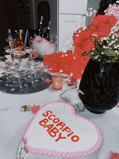 a table topped with a heart shaped cake