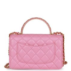 This Wallet on Chain with top handle is in pink lambskin and gold hardware. There is a zipper pocket under the front flap, slit front pocket, zipper compartment with logo pull, open pocket with six credit card slots and slit pocket on front wall, signature half moon exterior back pocket, and a tonal chain-link crossbody strap/shoulder strap. The interior is lined in pink leather with a zipper pocket under flap top, a slip pocket for cash, a zipper compartment with leather pull, and six credit card slots. Collection: 23A (RFID)Origin: ItalyCondition: New and never Accompanied by: Chanel box and Chanel dustbagMeasurements: 7.5" width x 5" height x 1.25" depth; 2" handle drop, 24" strap drop Chanel Wallet On Chain, Chanel Box, Chain Top, Front Wall, Wallet On Chain, Chanel Wallet, Leather Pulls, Vuitton Bag, Sierra Leone